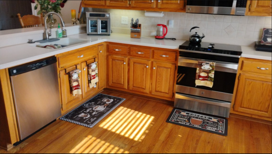 Spotless kitchen with detailed appliance cleaning